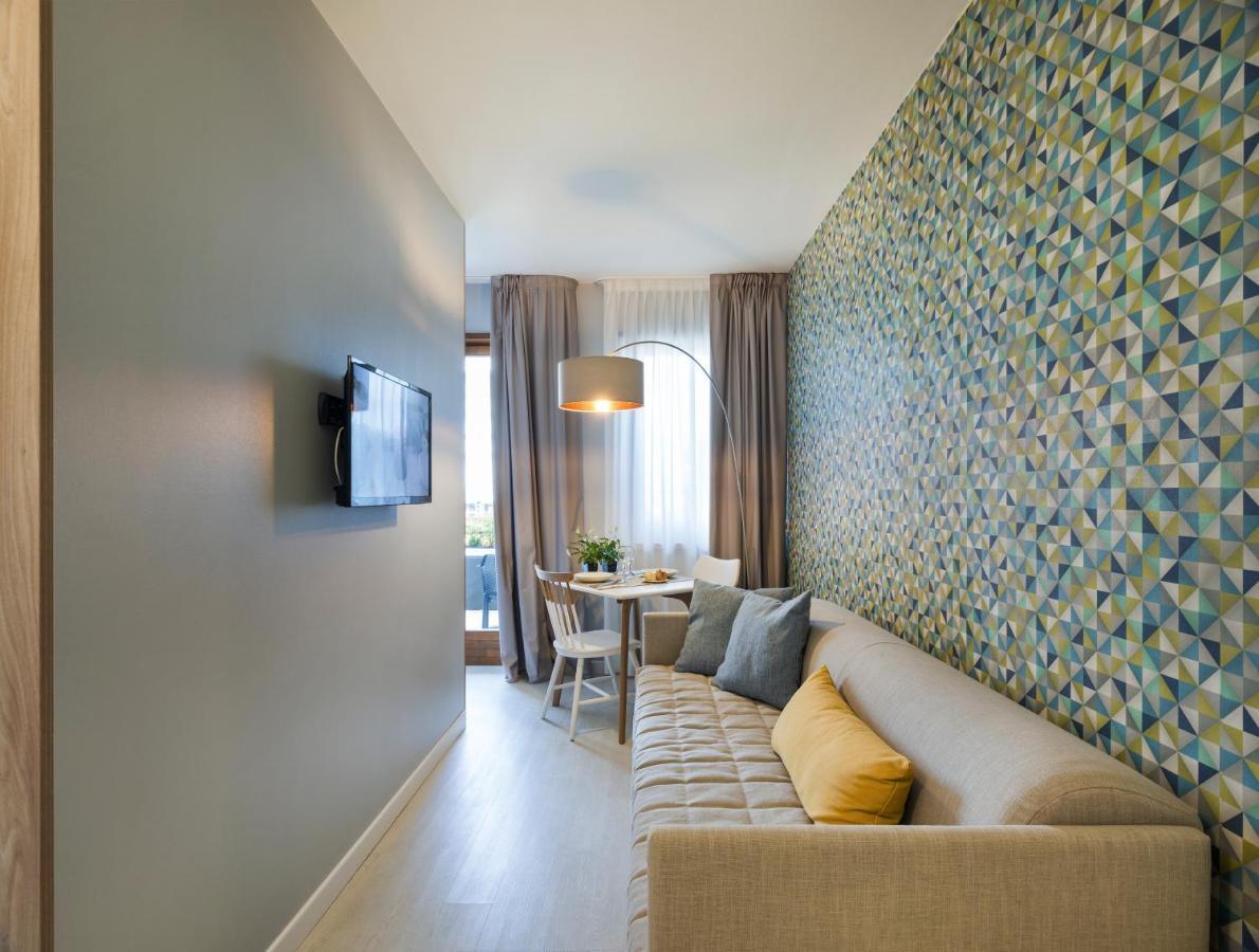 Hatelier Garda Home By Enjoy Garda Hotel เปสเคียรา เดล การ์ดา ภายนอก รูปภาพ