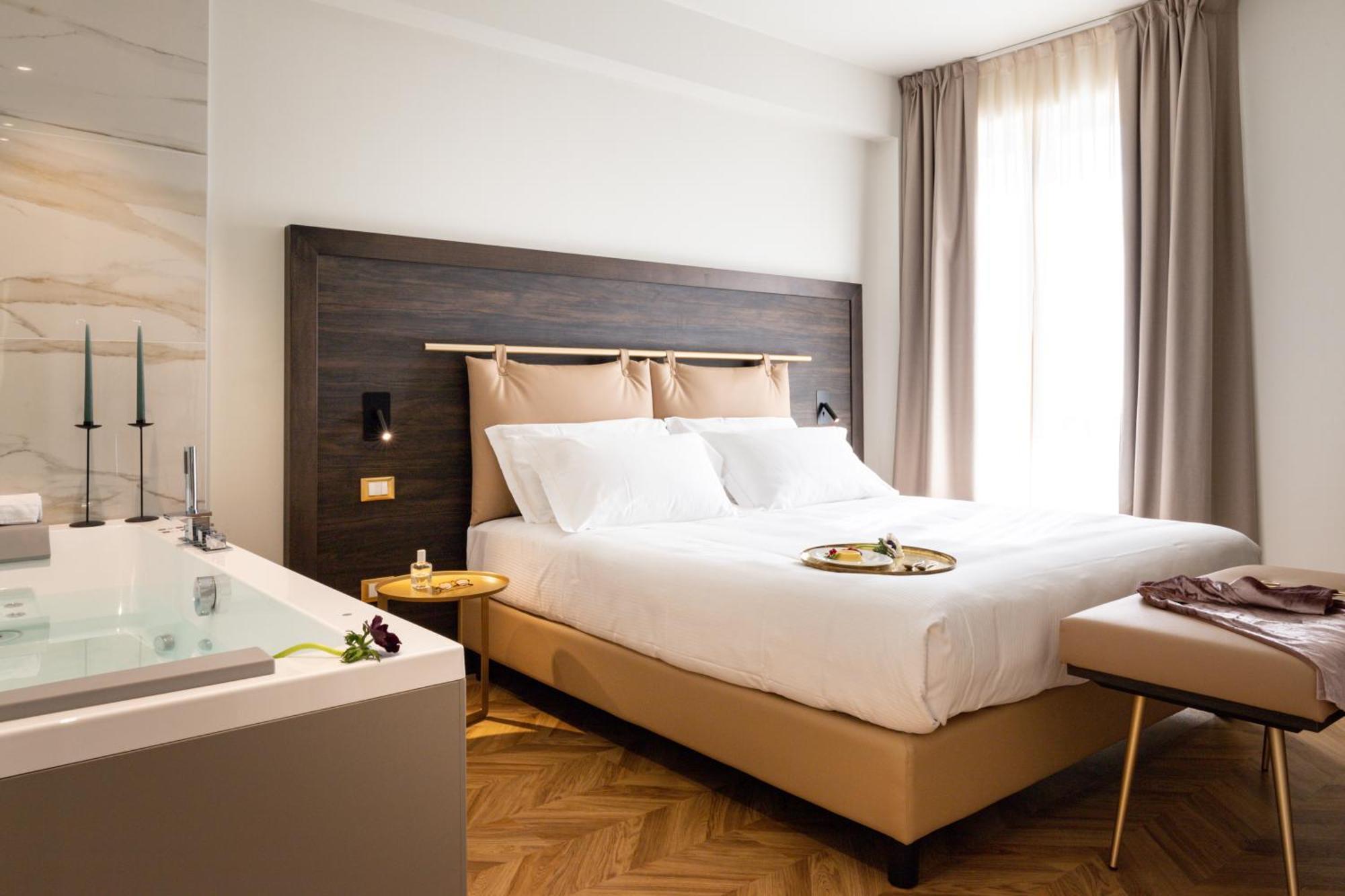 Hatelier Garda Home By Enjoy Garda Hotel เปสเคียรา เดล การ์ดา ภายนอก รูปภาพ