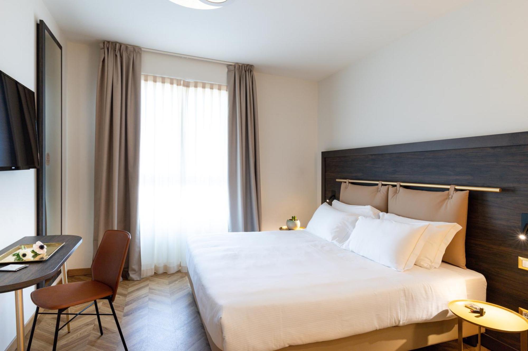 Hatelier Garda Home By Enjoy Garda Hotel เปสเคียรา เดล การ์ดา ภายนอก รูปภาพ
