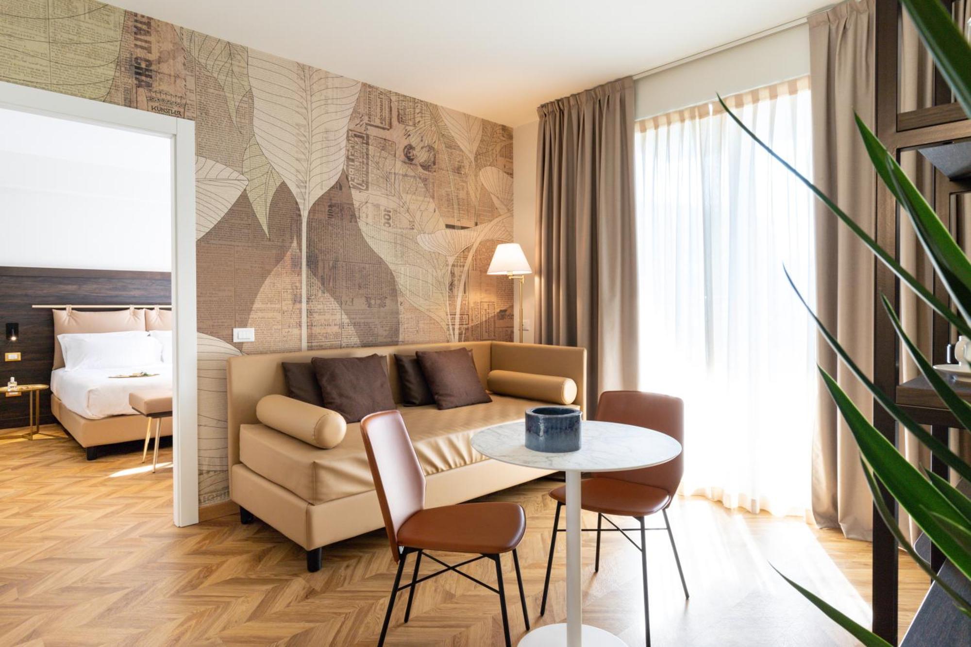 Hatelier Garda Home By Enjoy Garda Hotel เปสเคียรา เดล การ์ดา ภายนอก รูปภาพ