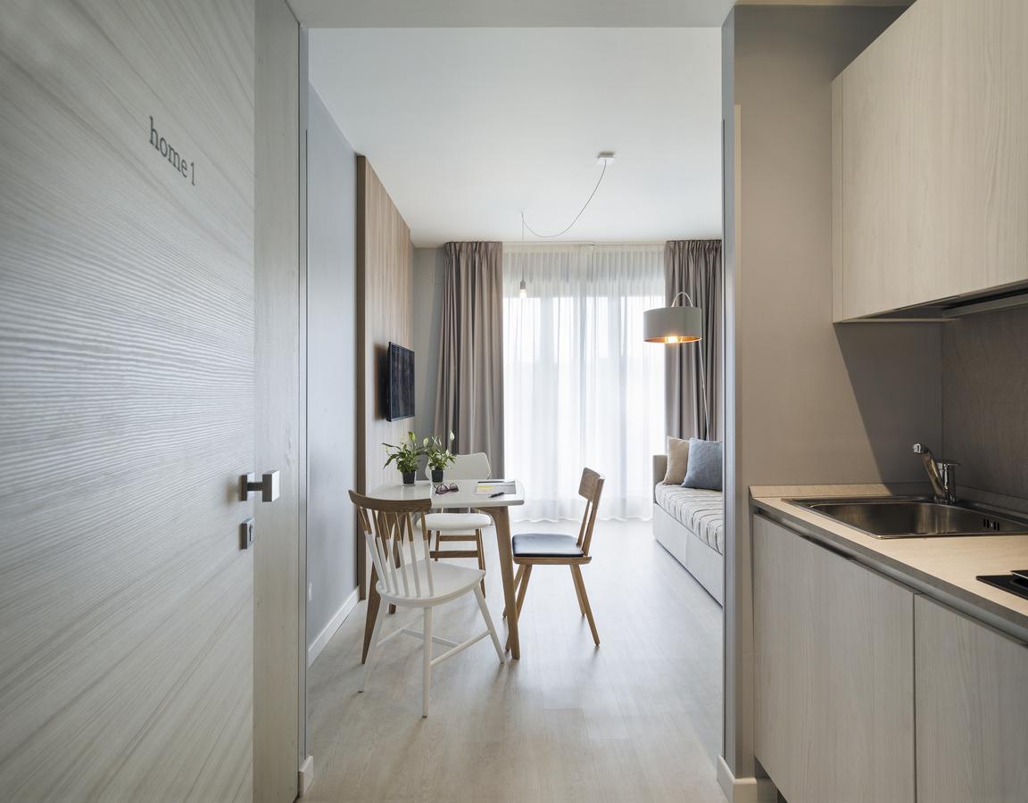 Hatelier Garda Home By Enjoy Garda Hotel เปสเคียรา เดล การ์ดา ภายนอก รูปภาพ