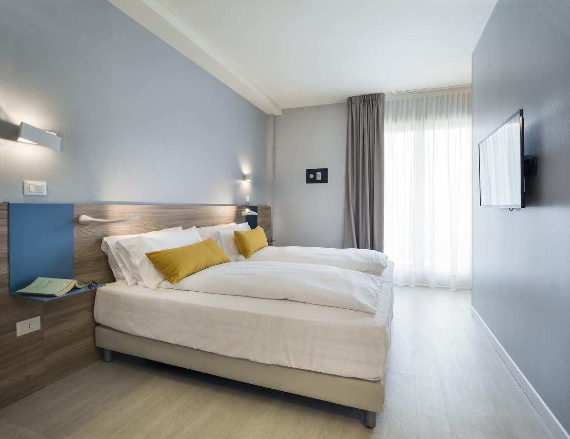 Hatelier Garda Home By Enjoy Garda Hotel เปสเคียรา เดล การ์ดา ภายนอก รูปภาพ
