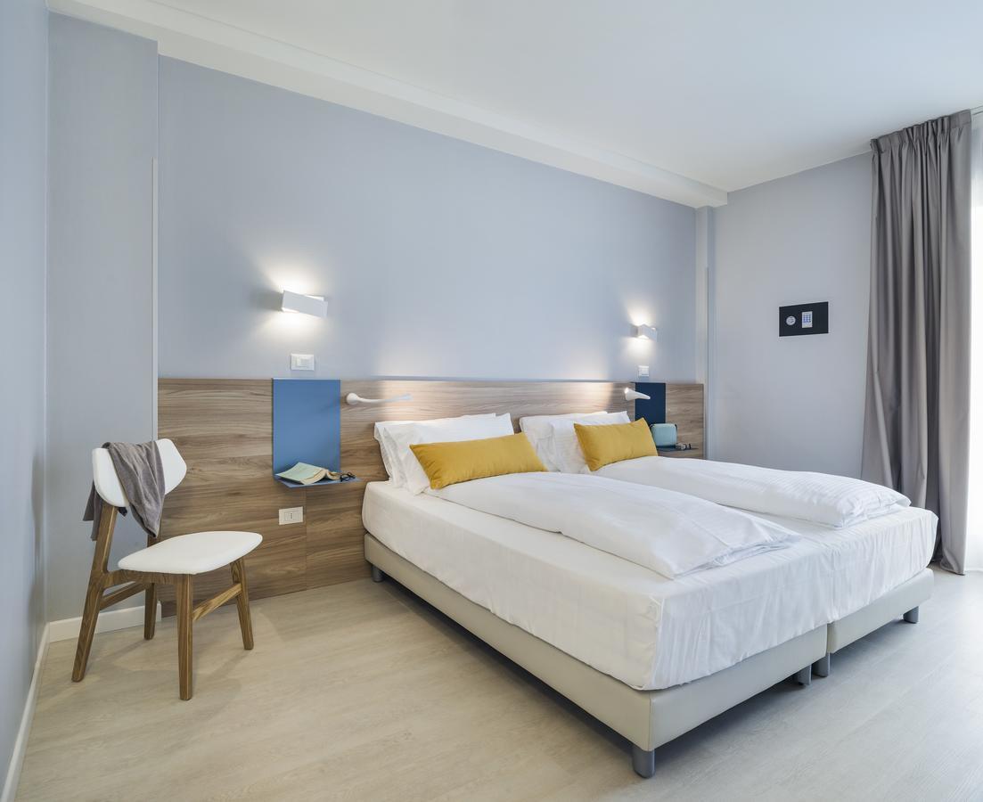 Hatelier Garda Home By Enjoy Garda Hotel เปสเคียรา เดล การ์ดา ภายนอก รูปภาพ